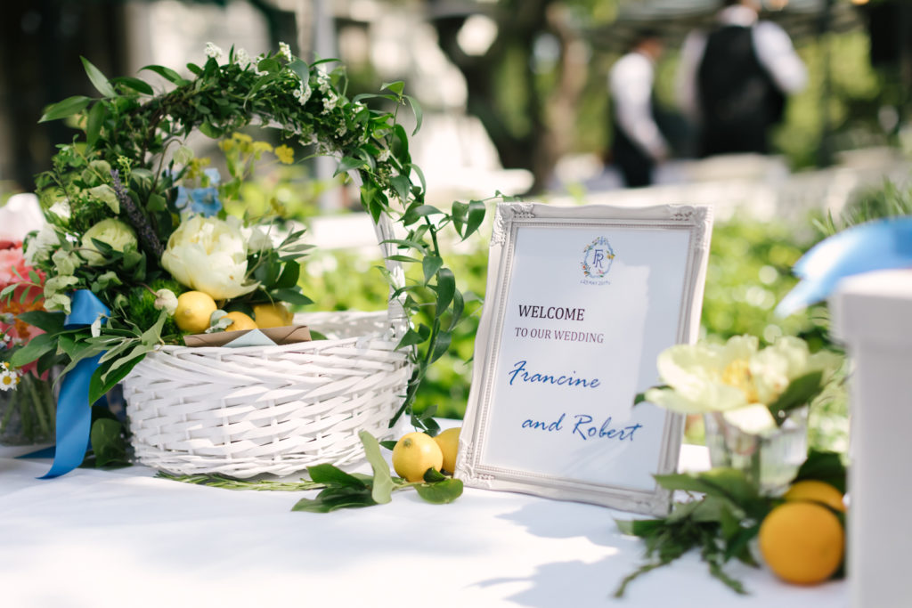 An Al Fresco Wedding reception at the Valley Hunt club, Italian inspired wedding reception, citrus basket at welcome table