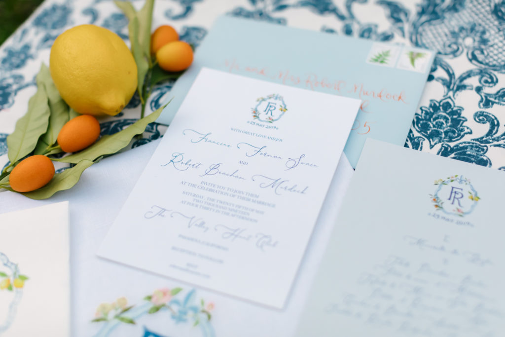 An Al Fresco Wedding at the Valley Hunt club, monogrammed invitation suite with blue, orange and green