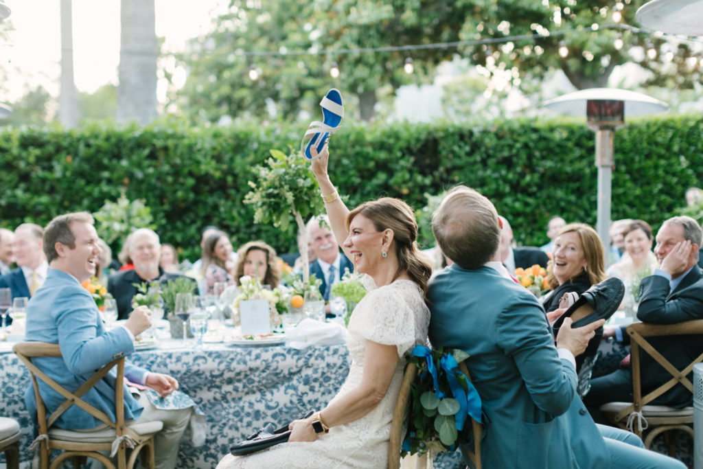 An Al Fresco Wedding reception at the Valley Hunt club, Italian inspired wedding reception, bride and groom shoe game
