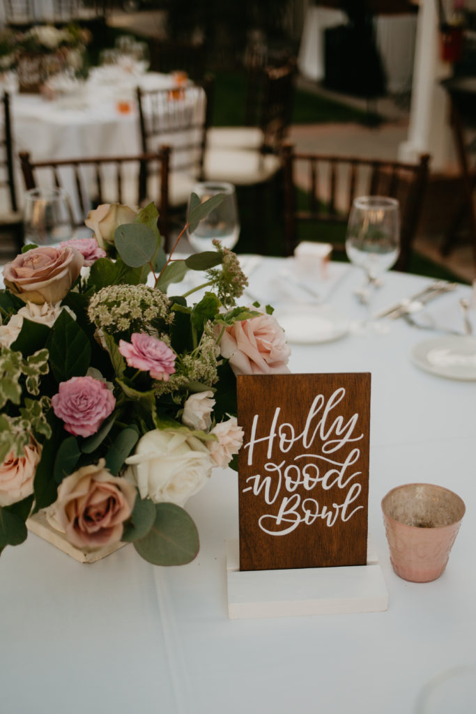A music festival themed wedding reception at The Inn at Rancho Santa Fe, music venue table number