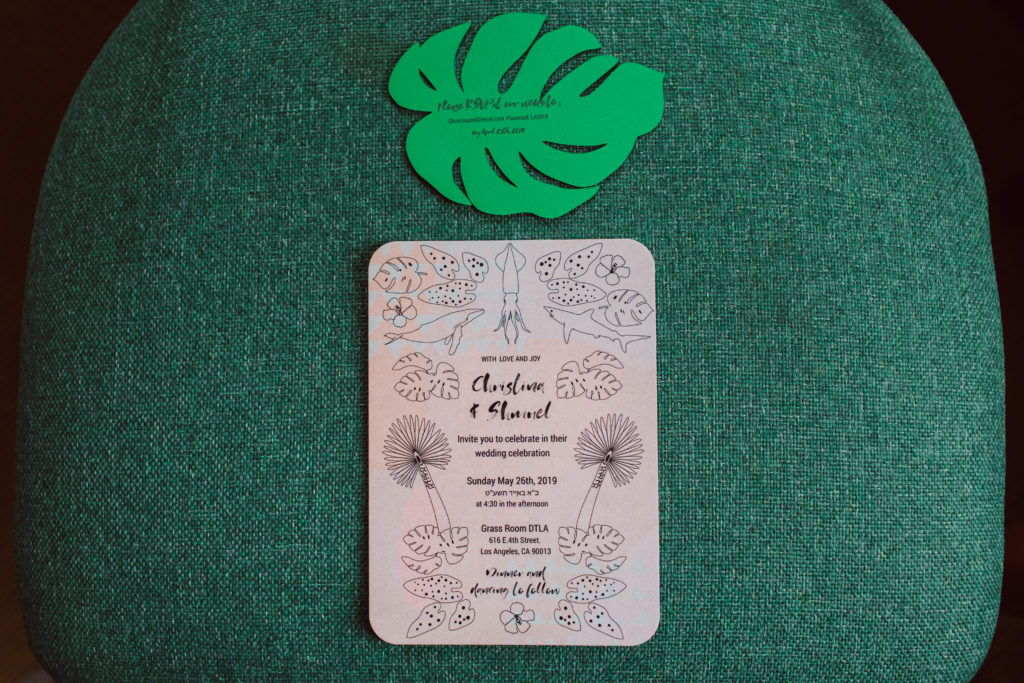a unique and colorful wedding at the Grass Room in downtown Los Angeles, pink monstera leaf wedding invitation suite