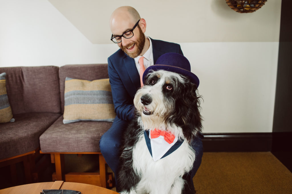 A unique and colorful wedding at the Grass Room in downtown Los Angeles, groom portrait shot with dog