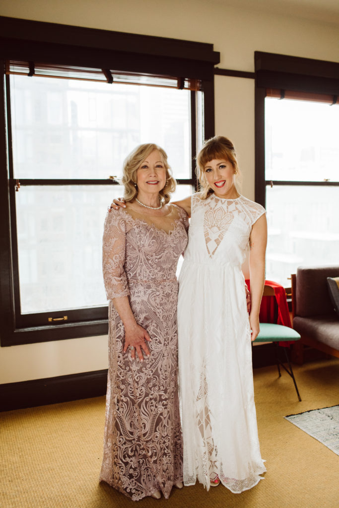 A unique and colorful wedding at the Grass Room in downtown Los Angeles, bride portrait shot with mother