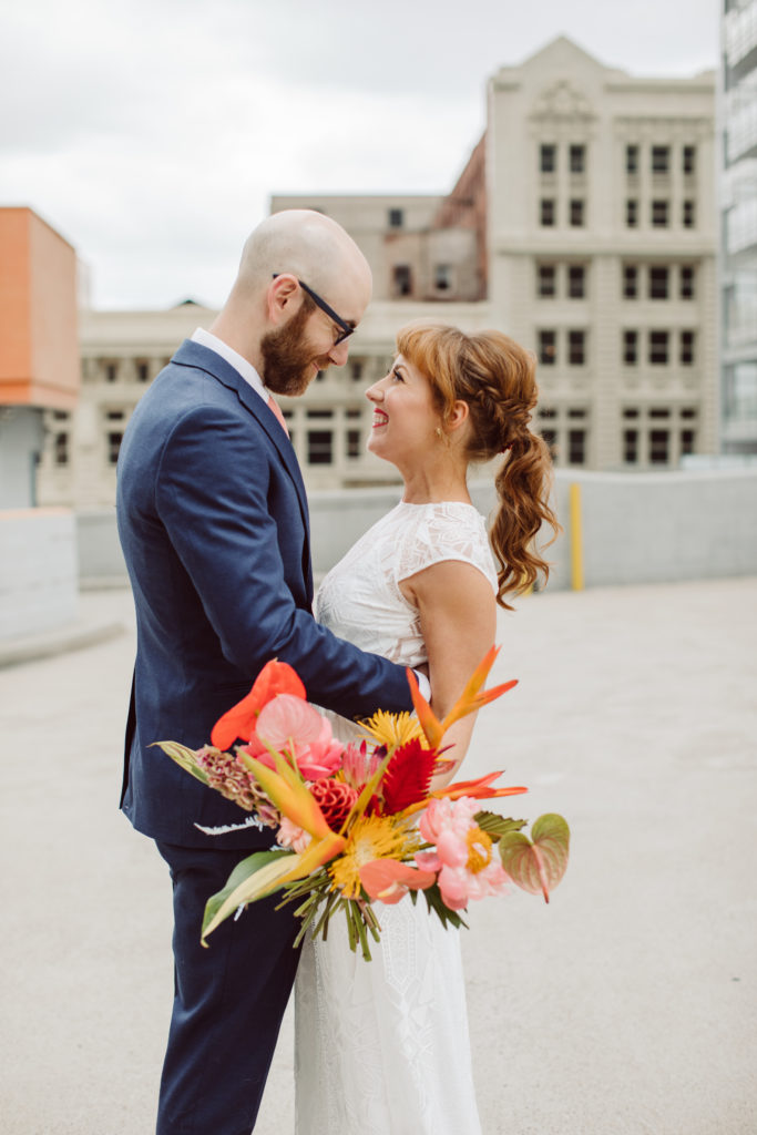 A unique and colorful wedding at the Grass Room in downtown Los Angeles, bride and groom portrait shot in downtown LA