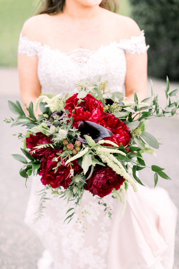 An ocean view wedding ceremony at The Redondo Beach Historic Library, bridal bouquet with red peonies 