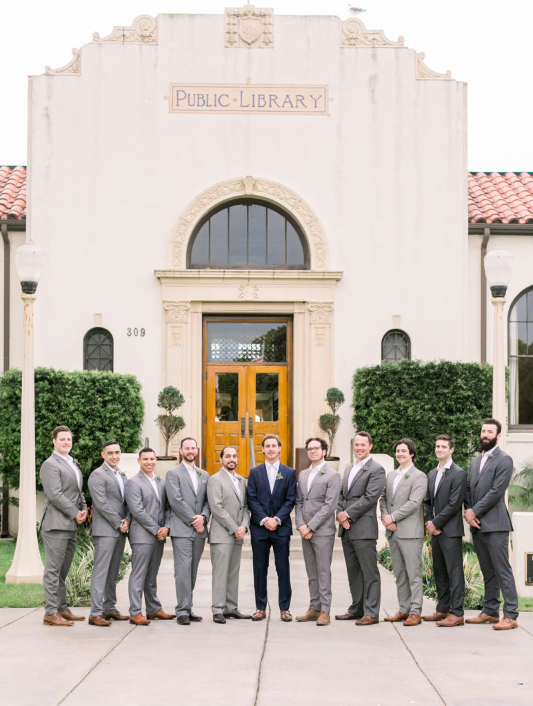 An ocean view wedding ceremony at The Redondo Beach Historic Library, groom and groomsmen portrait shot