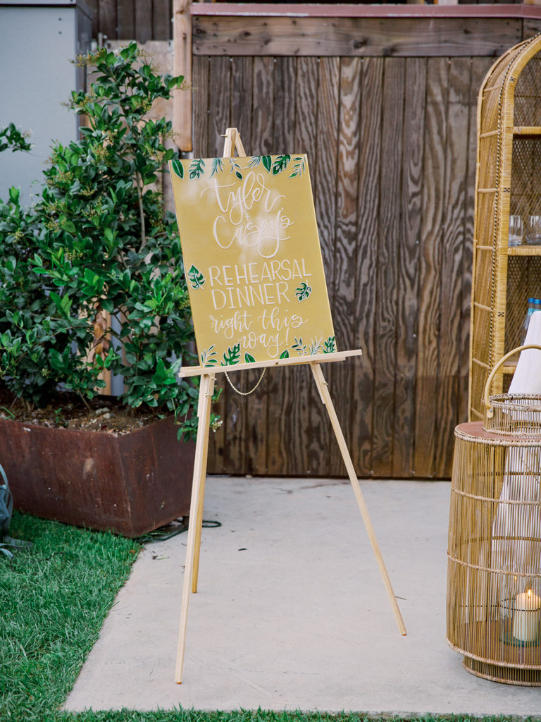 A California-cool rehearsal dinner at Calamigos Ranch, yellow acrylic welcome sign