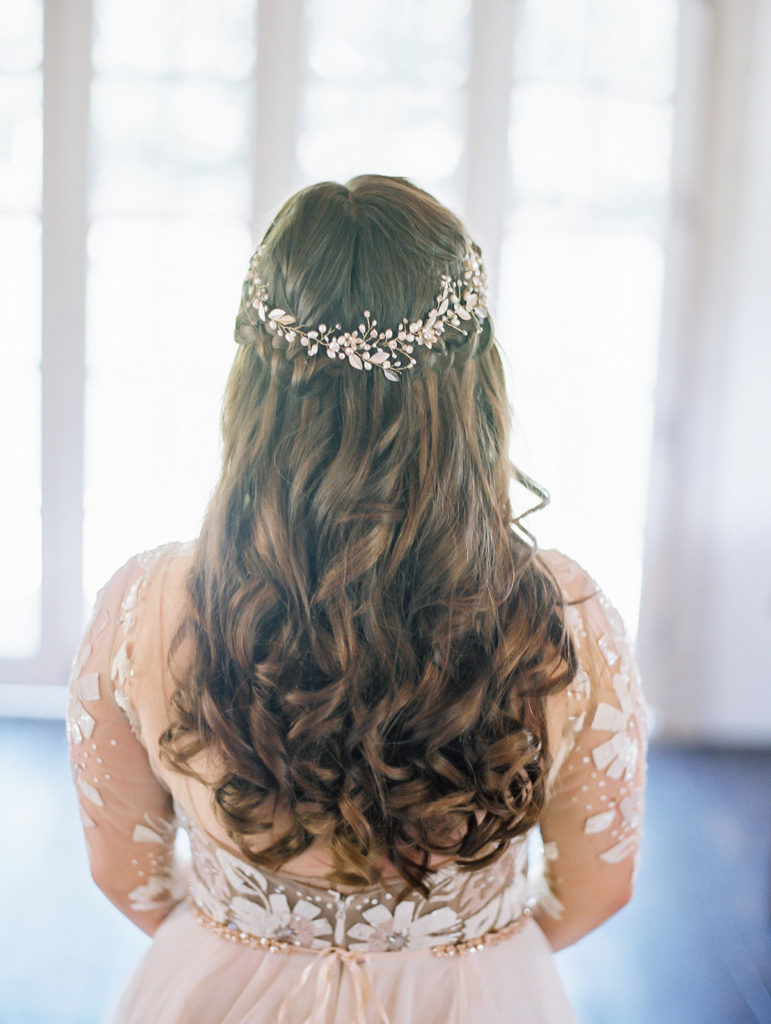 A colorful and vibrant wedding at Triunfo Creek Vineyards, bride wearing crystal crown with hair down