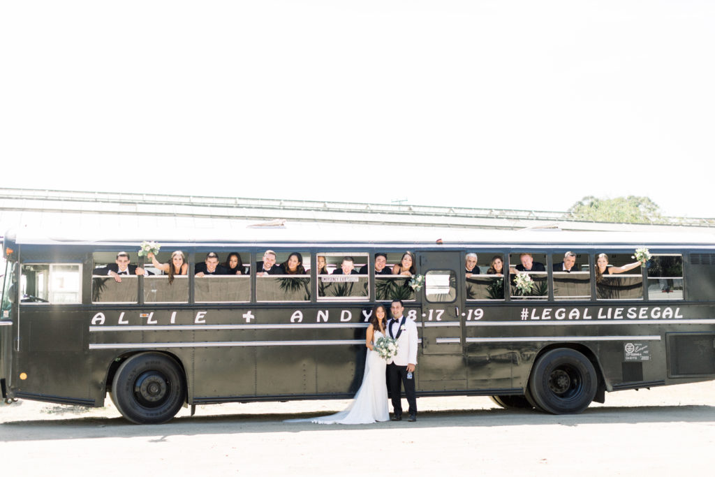 A classic greenhouse wedding ceremony at Dos Pueblos Orchid Farm, customized school bus for wedding reception