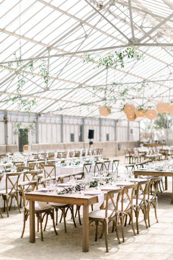 A classic greenhouse wedding reception at Dos Pueblos Orchid Farm, minimalist wedding reception with rattan lantern