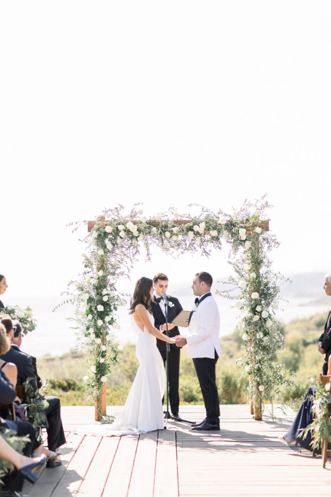 A classic greenhouse wedding ceremony at Dos Pueblos Orchid Farm