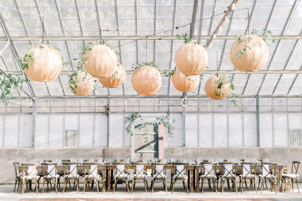 A classic greenhouse wedding reception at Dos Pueblos Orchid Farm, modern and minimalist wedding reception with rattan lantern