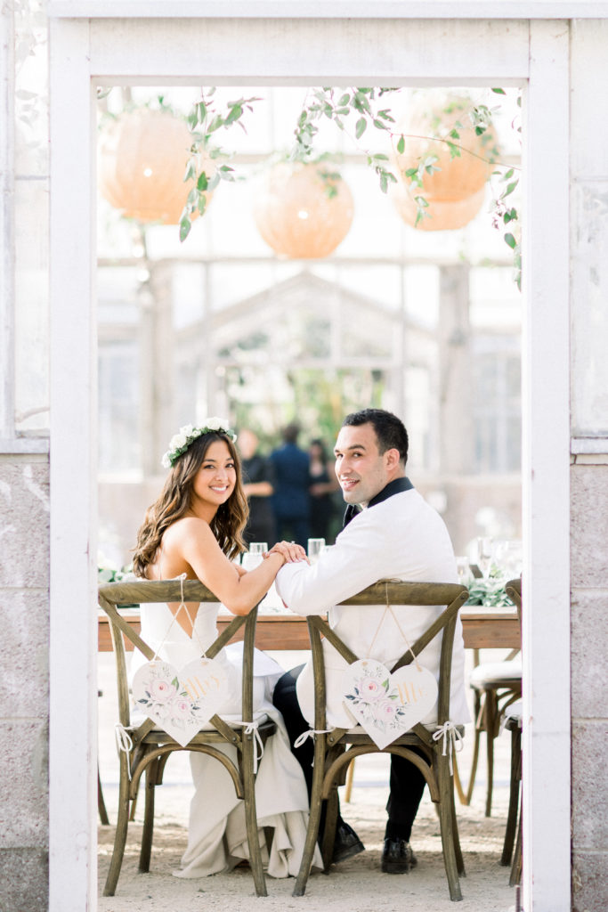 A classic greenhouse wedding reception at Dos Pueblos Orchid Farm, bride and groom portrait shot