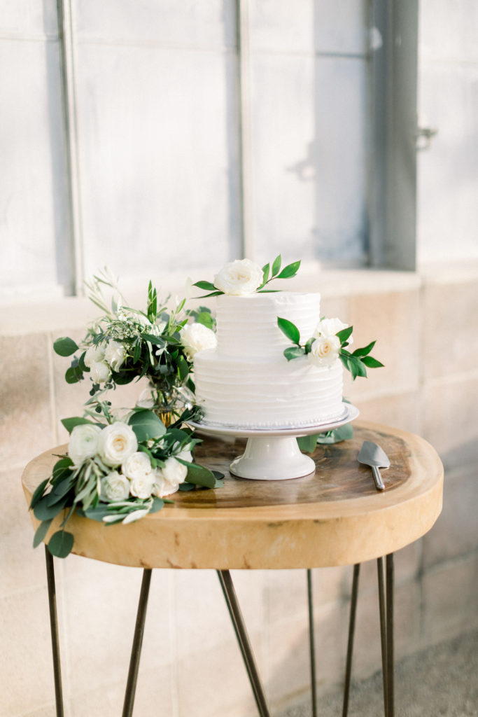 A classic greenhouse wedding reception at Dos Pueblos Orchid Farm, minimalist wedding cake