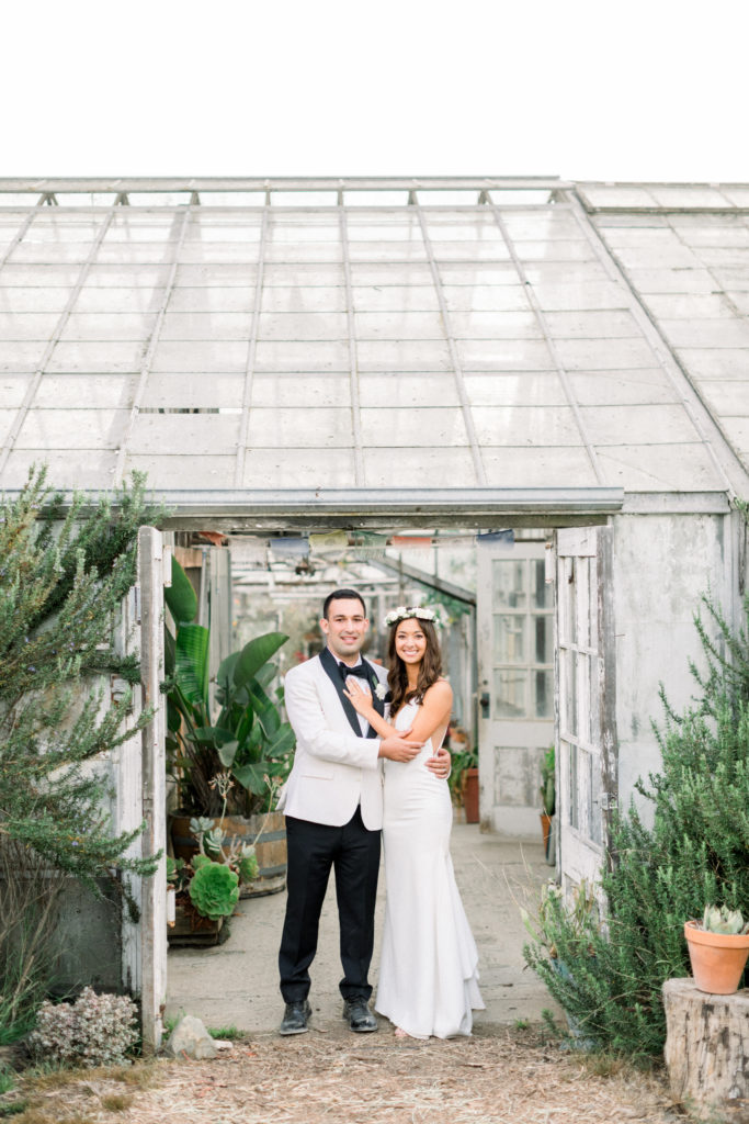 A classic greenhouse wedding ceremony at Dos Pueblos Orchid Farm, bride and groom portrait shot