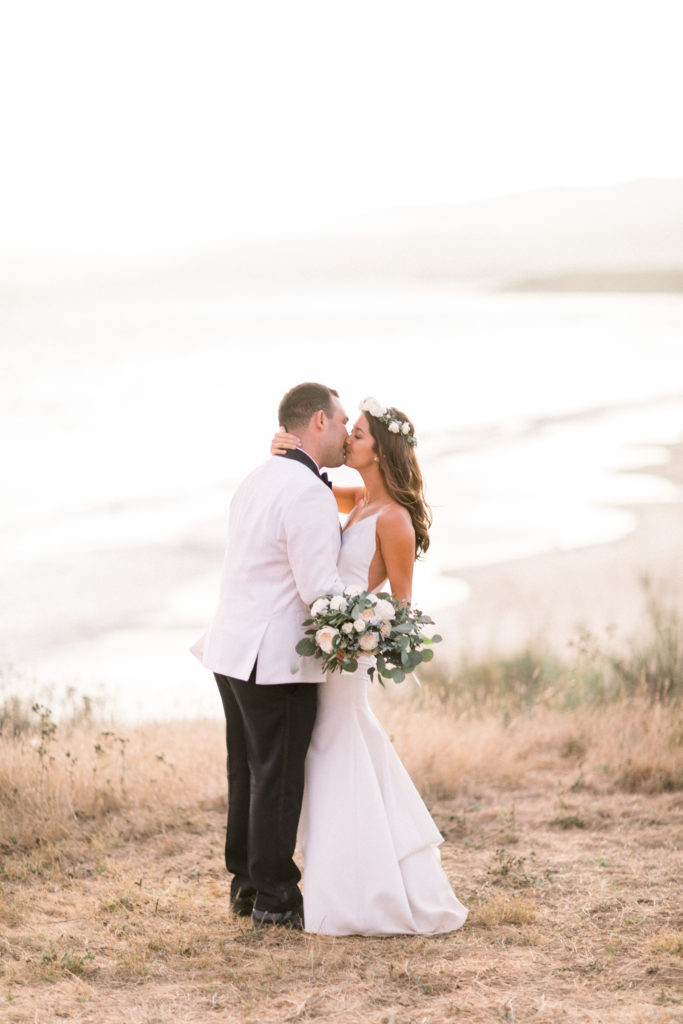 A classic greenhouse wedding reception at Dos Pueblos Orchid Farm, bride and groom sunset portrait shot on the beach