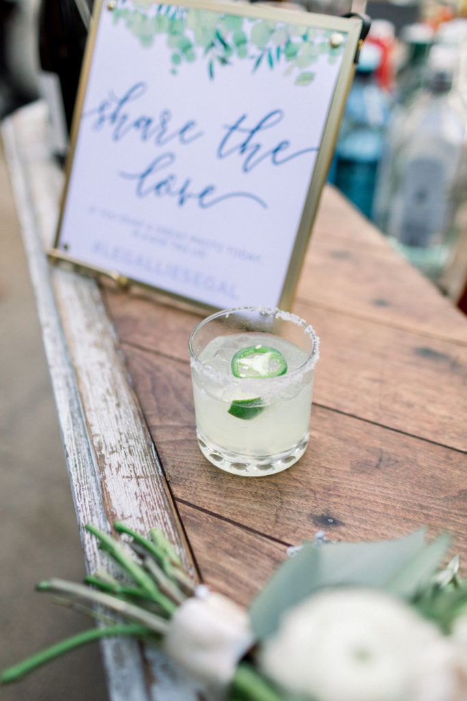 A classic greenhouse wedding reception at Dos Pueblos Orchid Farm, signature cocktail