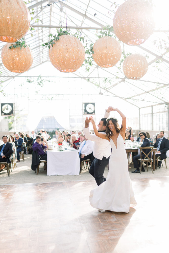 A classic greenhouse wedding reception at Dos Pueblos Orchid Farm, bride and groom first dance