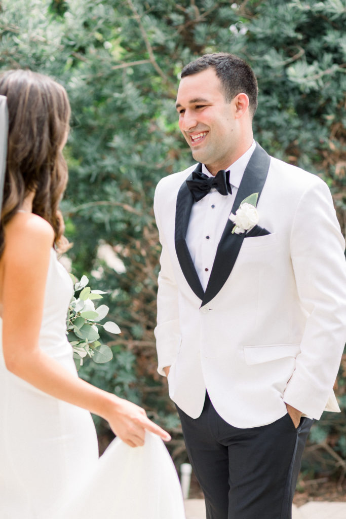 A classic greenhouse wedding at Dos Pueblos Orchid Farm, bride and groom first look