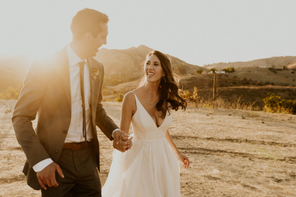 A whimsical wedding at Triunfo Creek Vineyards, sunset bride and groom portrait