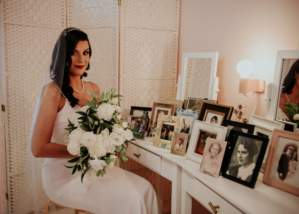 Beautiful wedding at The Unique Space in downtown LA, glamorous bridal style with all white flower bouquet