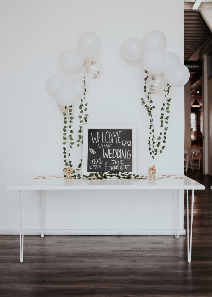 Beautiful wedding at The Unique Space in downtown LA, chalkboard wedding welcome sign