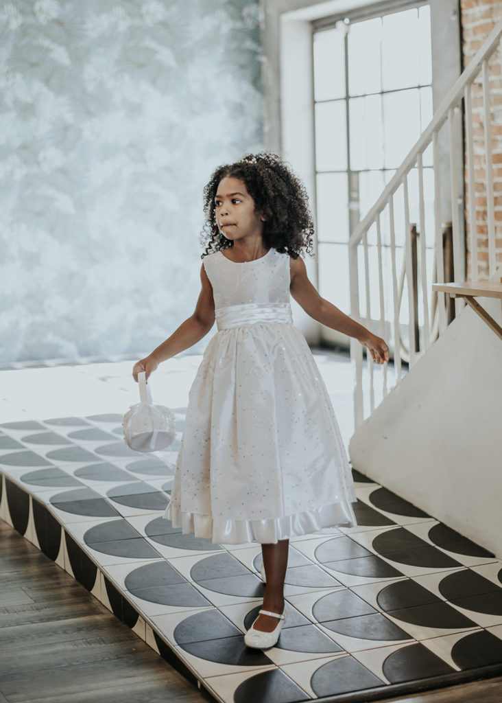 Beautiful wedding at The Unique Space in downtown LA, flower girl processional during wedding ceremony 