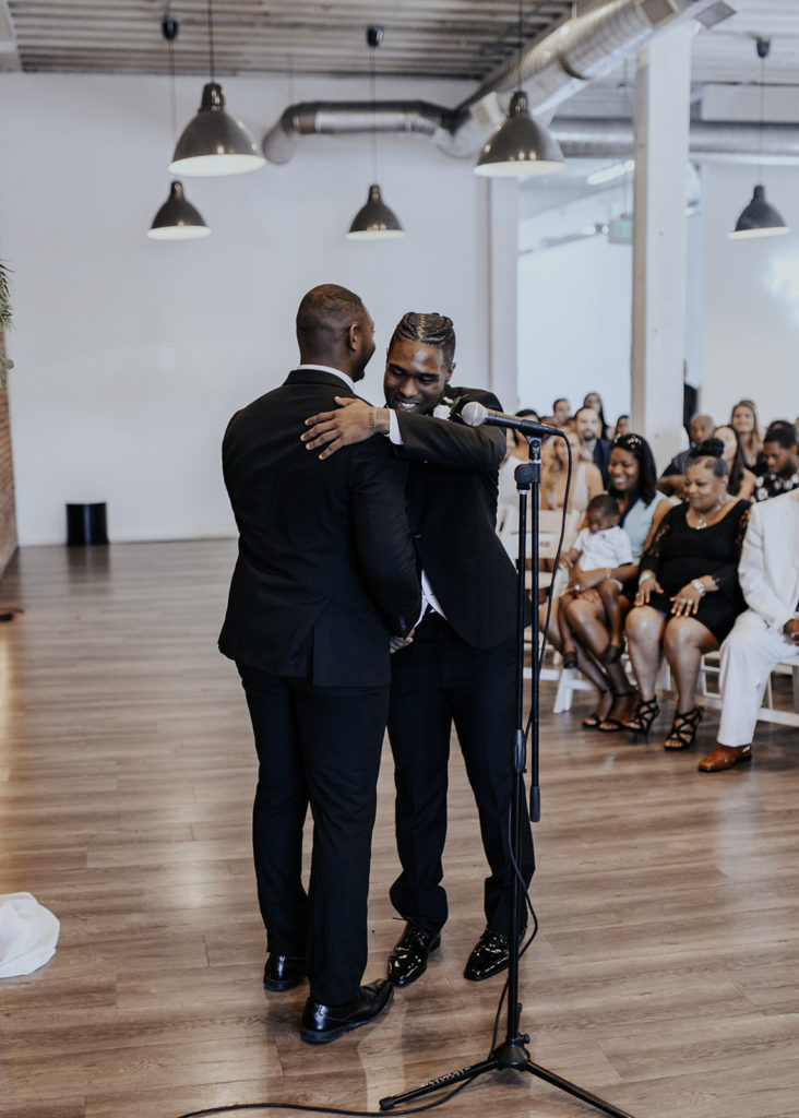 Beautiful wedding at The Unique Space in downtown LA, groom processional during wedding ceremony 