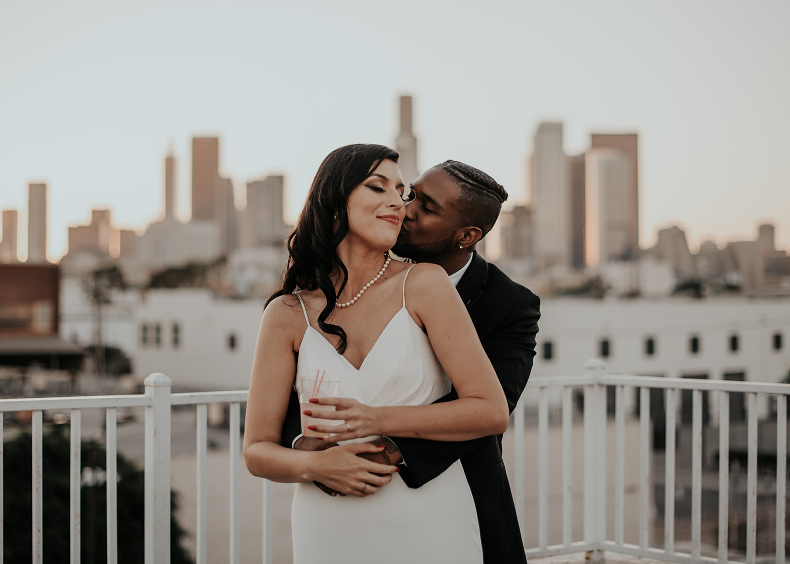 Beautiful wedding at The Unique Space in downtown LA, bride and groom portrait shot with downtown city skyline, DTLA wedding venues