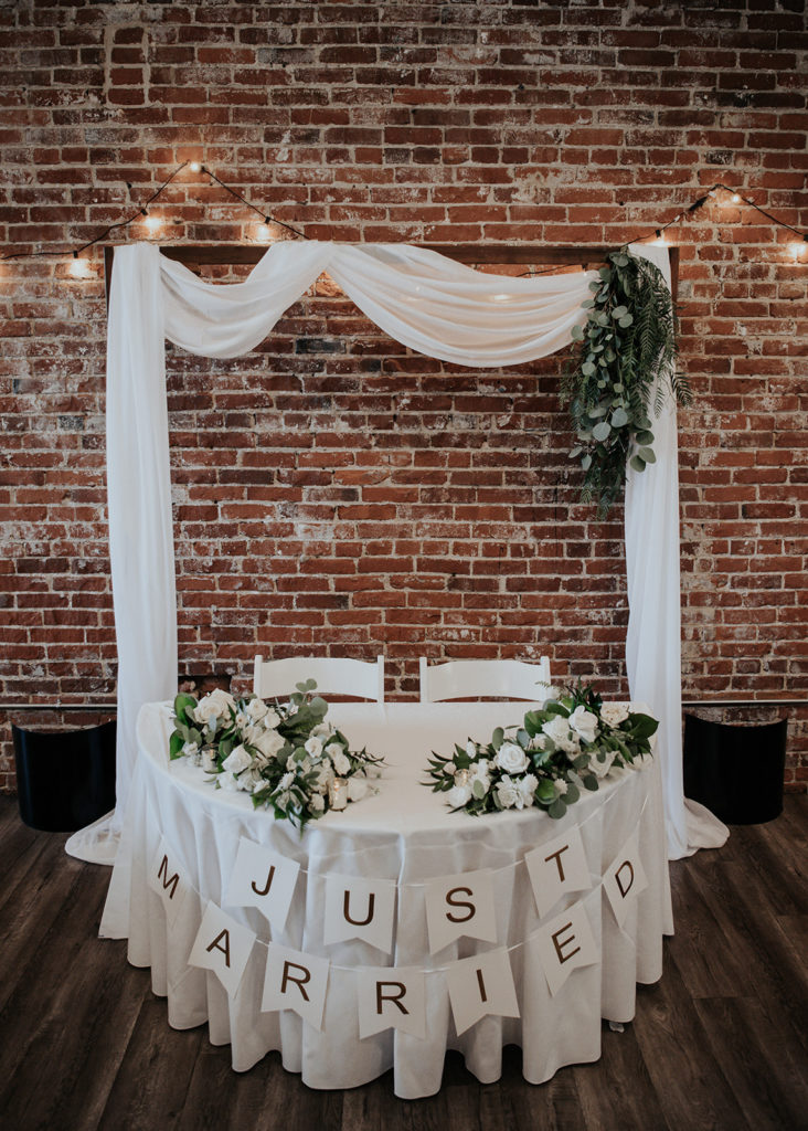 Beautiful wedding at The Unique Space in downtown LA, sweetheart table at reception