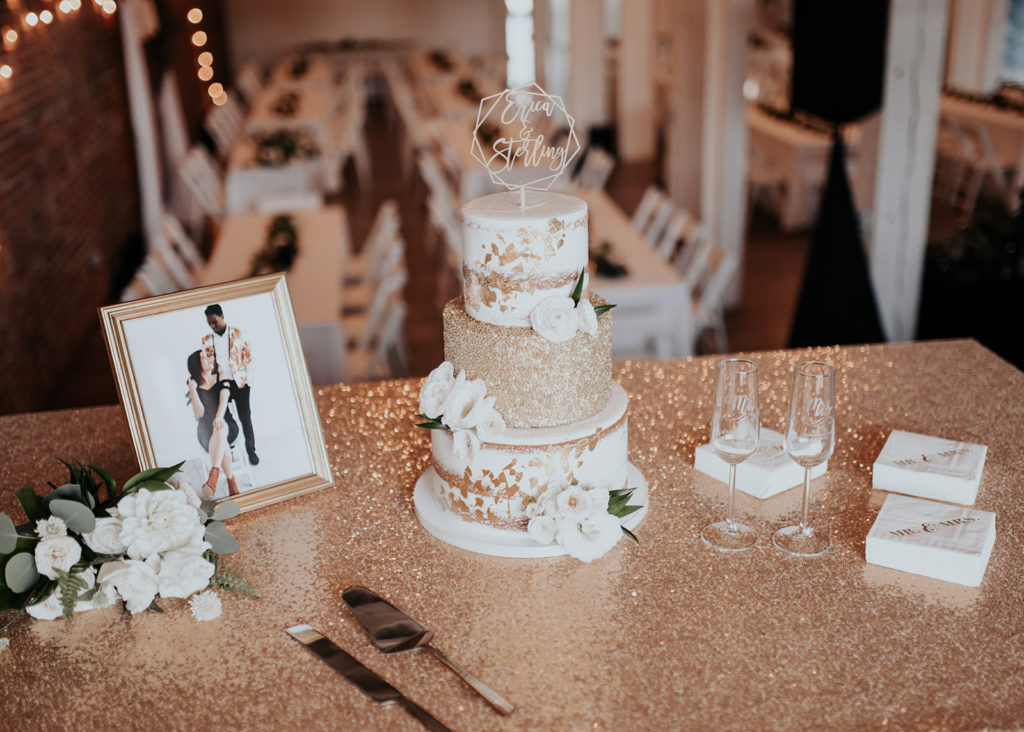 Beautiful wedding at The Unique Space in downtown LA, gold cake table