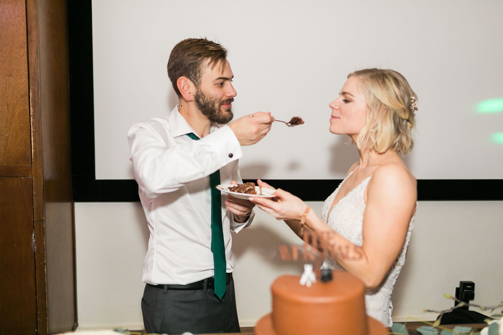 A Romantic Forest Inspired Wedding reception at the 1909, cake cutting