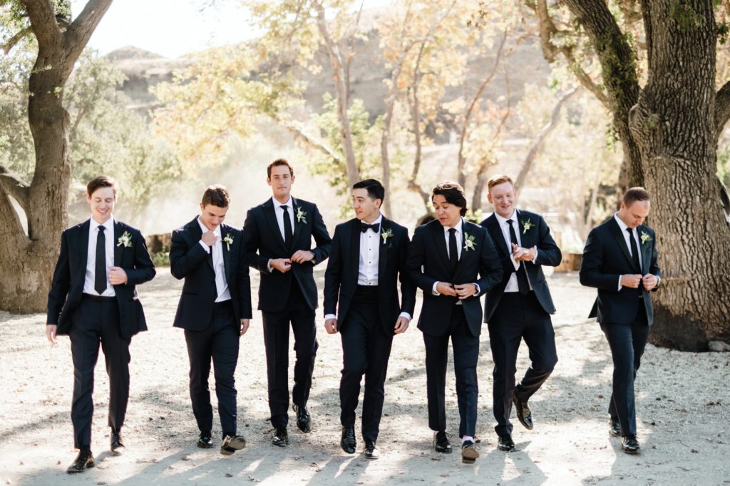 A Classic Vineyard Wedding at Triunfo Creek Vineyards, groom and groomsmen in black suits