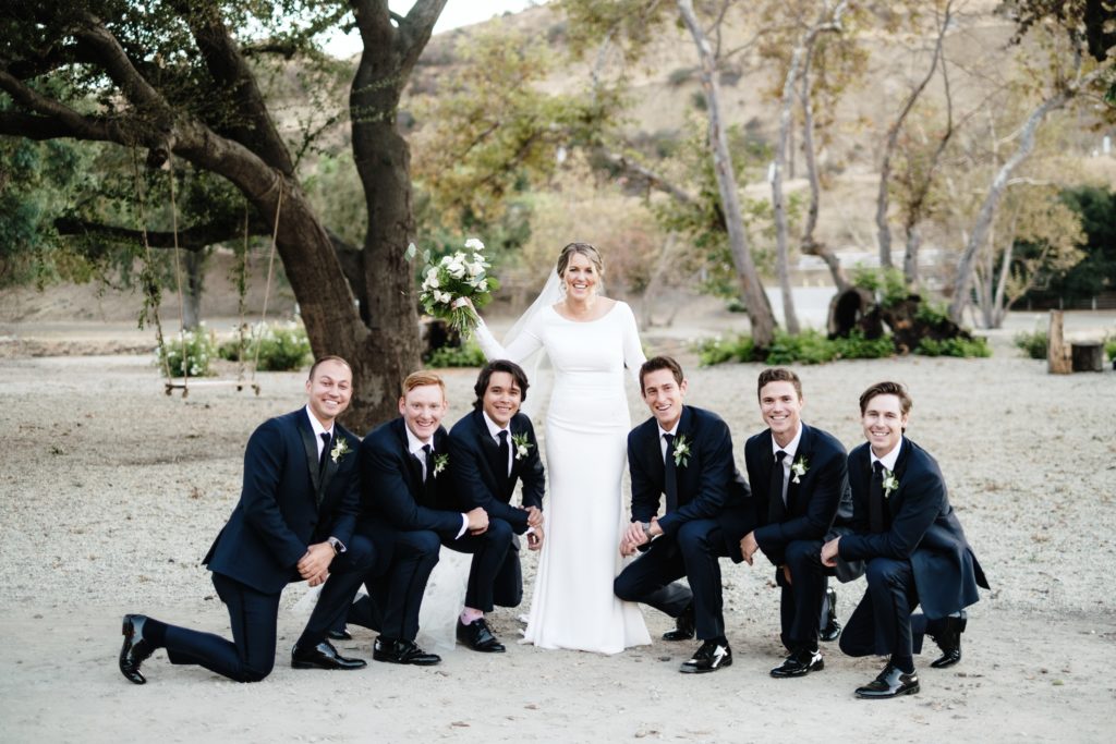 A Classic Vineyard Wedding at Triunfo Creek Vineyards, wedding party portraits, bride with groomsmen in black suits