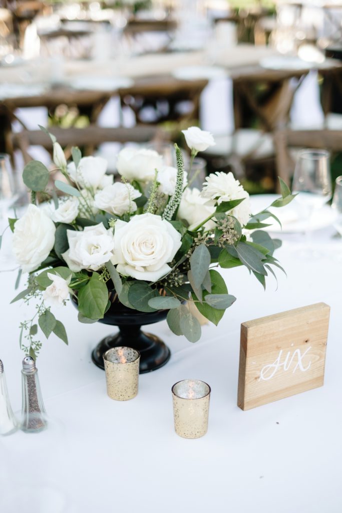 A Classic Vineyard Wedding reception at Triunfo Creek Vineyards, green and white floral centerpieces