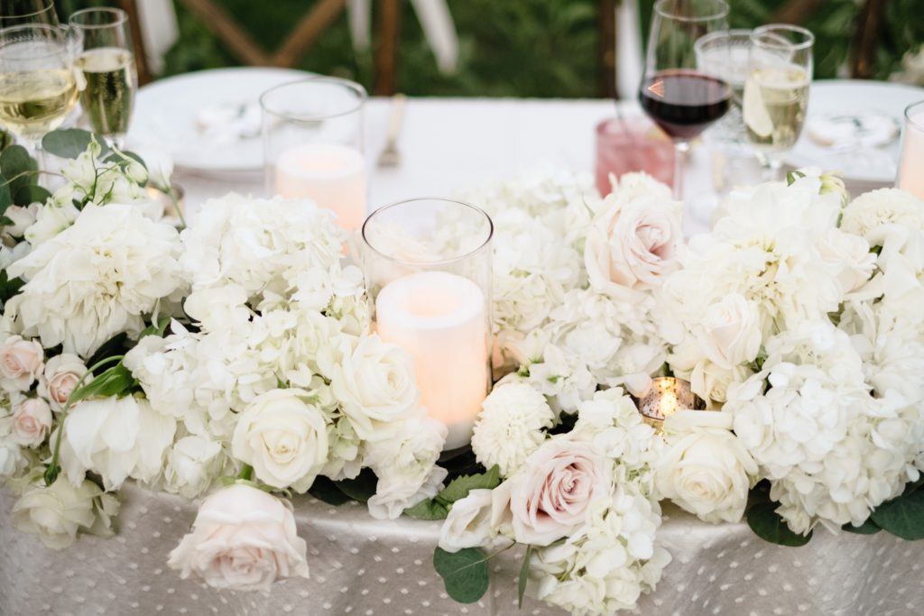 A Classic Vineyard Wedding reception at Triunfo Creek Vineyards, green and white flowers
