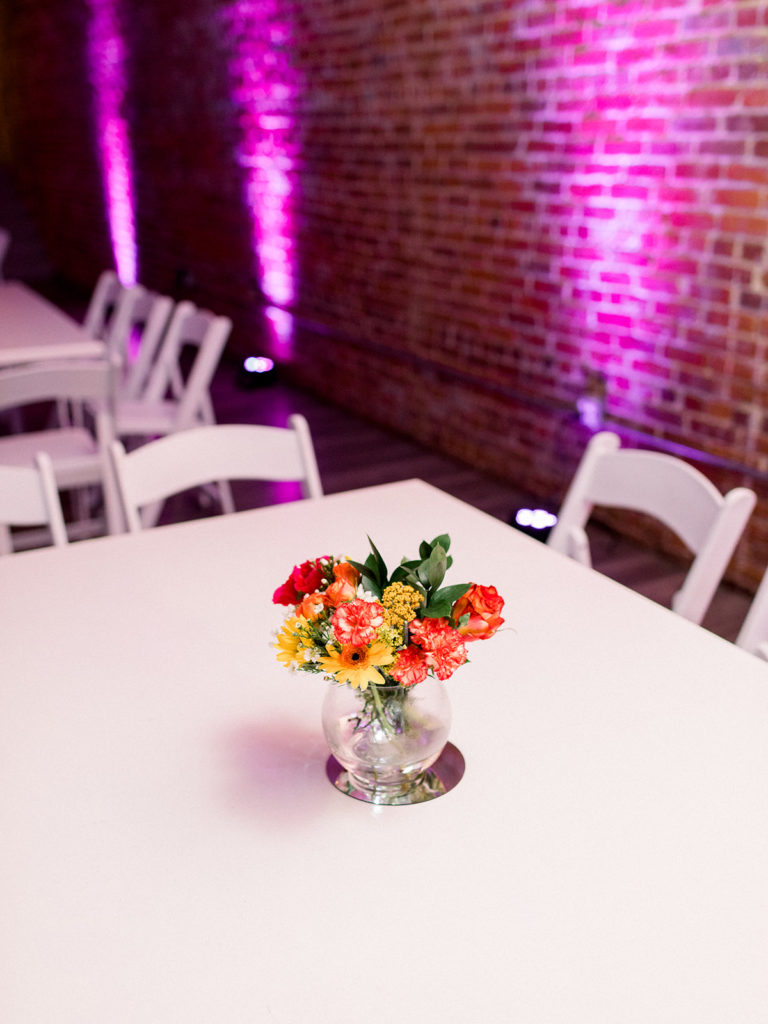 A lively sangeet celebration at The Unique Space in DTLA, colorful centerpiece