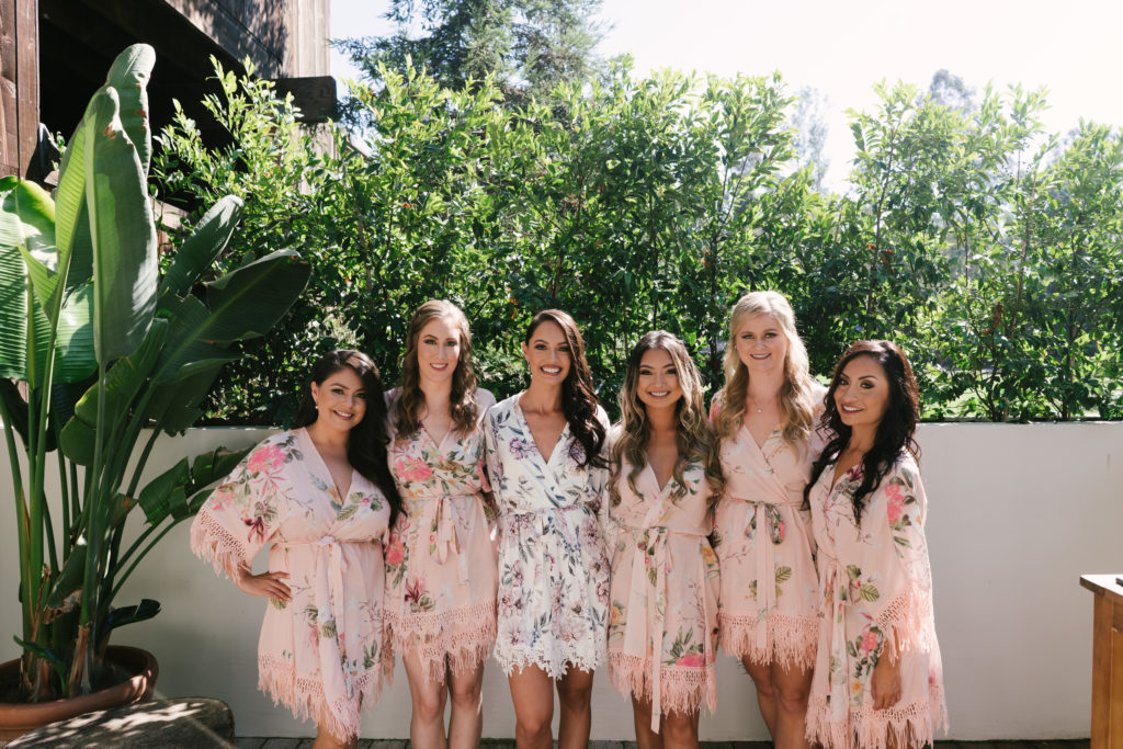 A Fall Wedding at Calamigos Ranch, bride with bridesmaids in floral robes