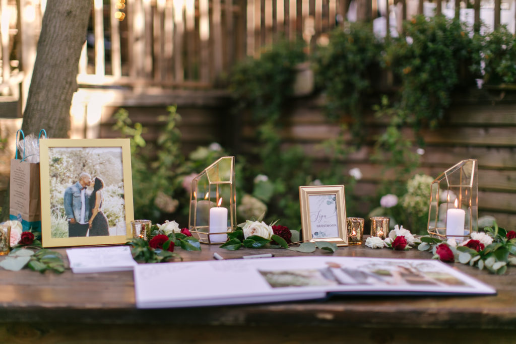 A Fall Wedding ceremony at Calamigos Ranch,  welcome table with gold frames