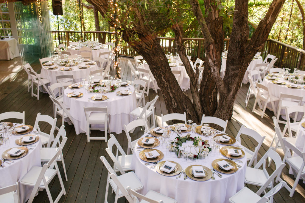 A Fall Wedding reception at Calamigos Ranch with gold accents
