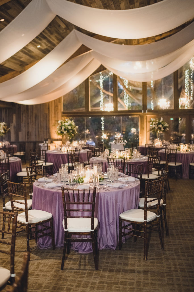 A Springtime Malibu Wedding reception at Calamigos Ranch, Redwood Room with lilac details