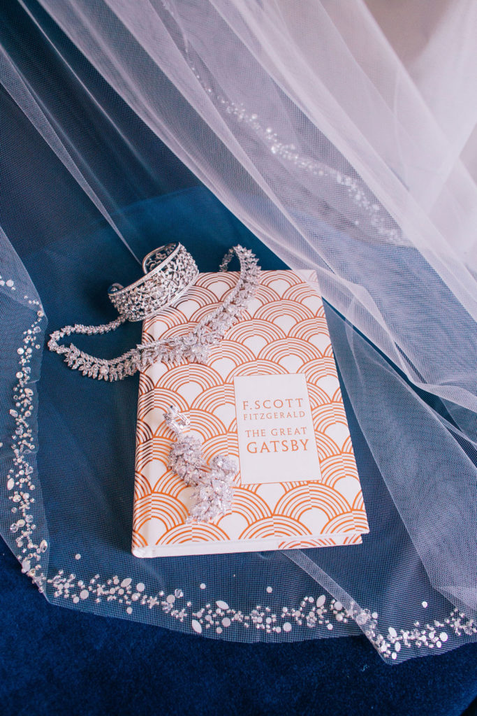 A Storybook Themed Wedding at the York Manor, bride's favorite book with her bridal jewelry 