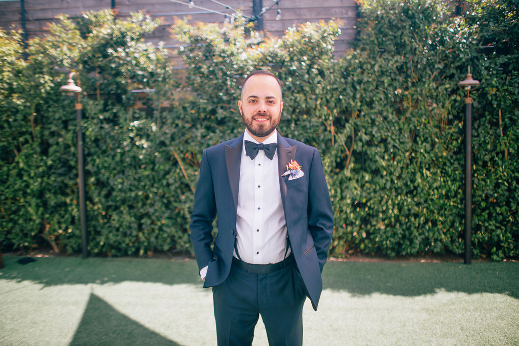 groom portrait shot with navy suit