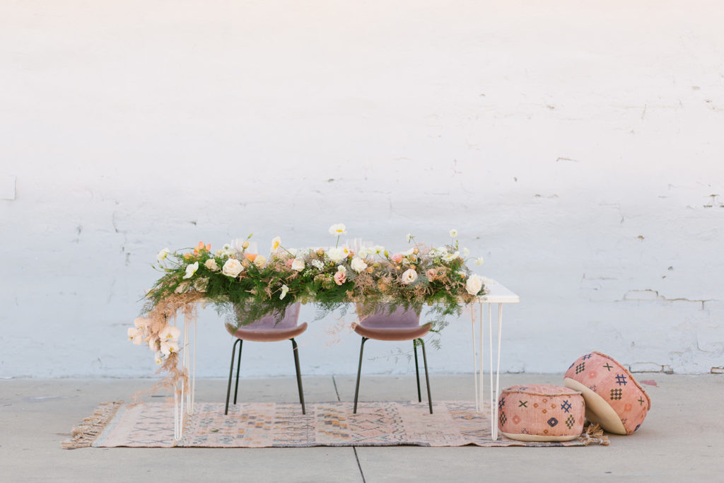 cotton candy inspired styled shoot, wedding reception set up with colorful earth tones