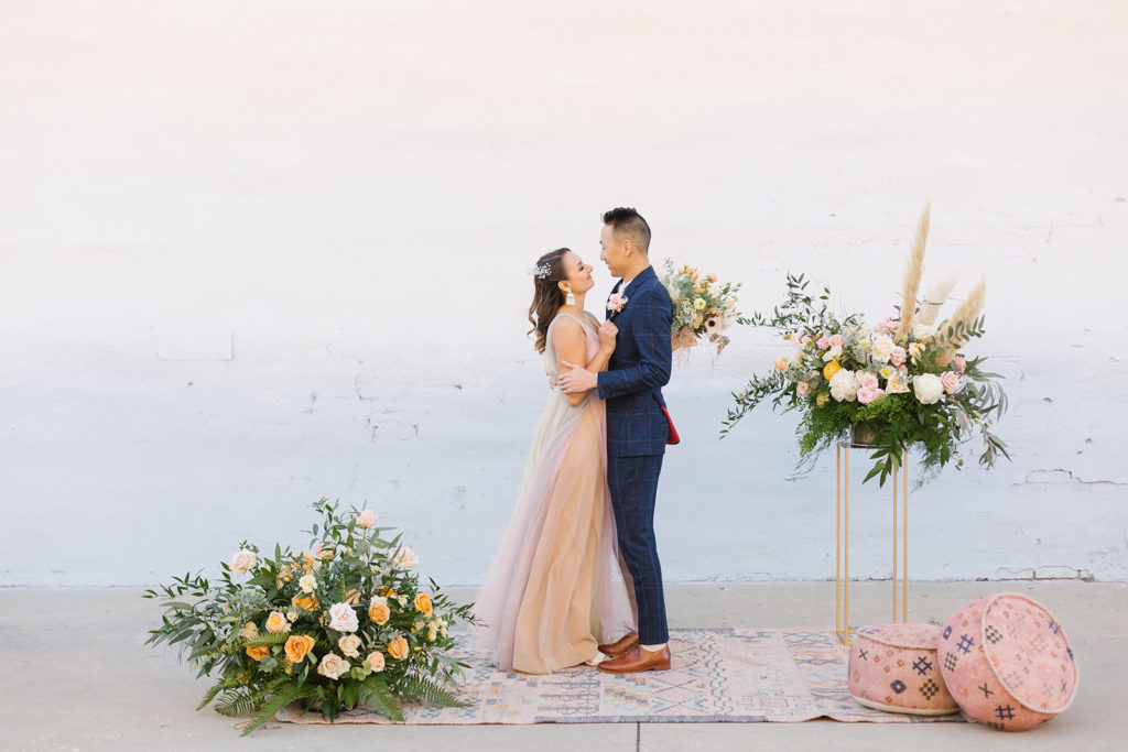 cotton candy inspired styled shoot, wedding ceremony with pink and peach earth tones