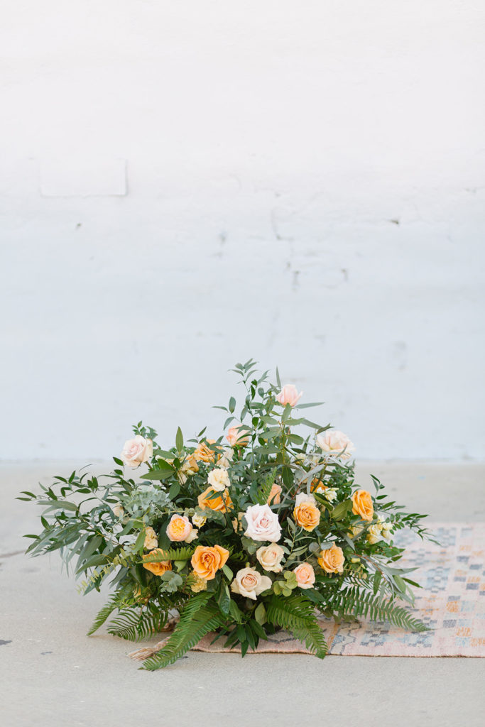 pastel floral arrangement for wedding ceremony