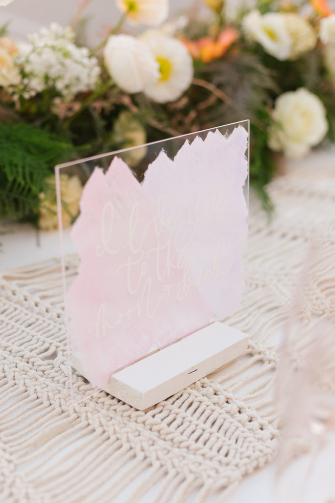 soft pink acrylic wedding reception table sign