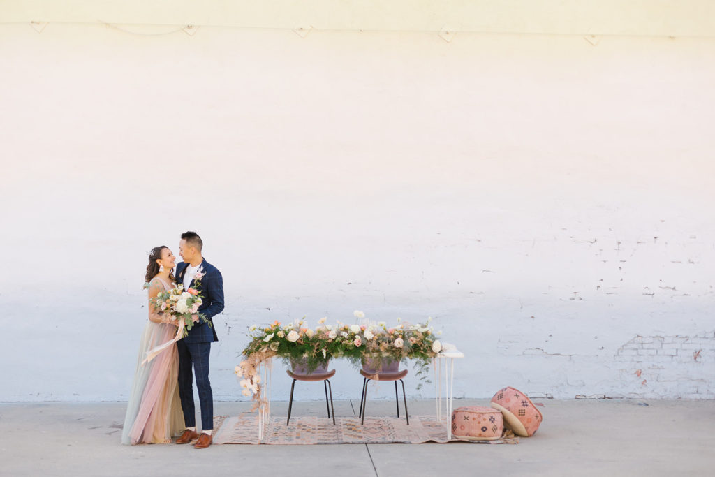 cotton candy themed wedding reception with sunset earth tones 