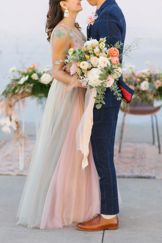 cotton candy themed wedding reception with sunset earth tones, bridal bouquet