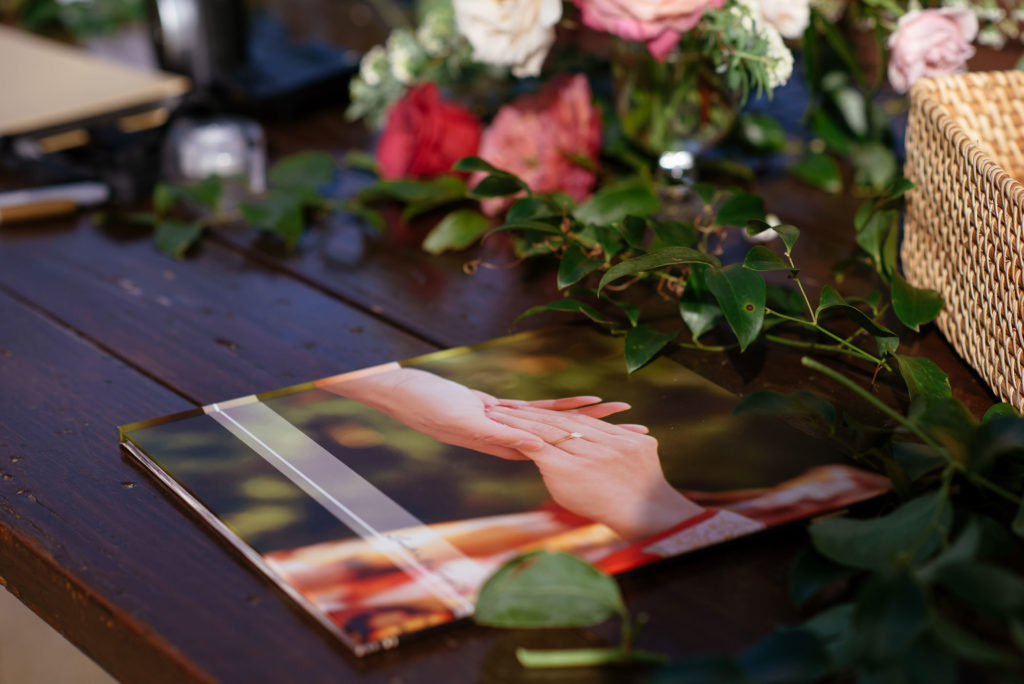 wedding welcome table with polaroid guest book